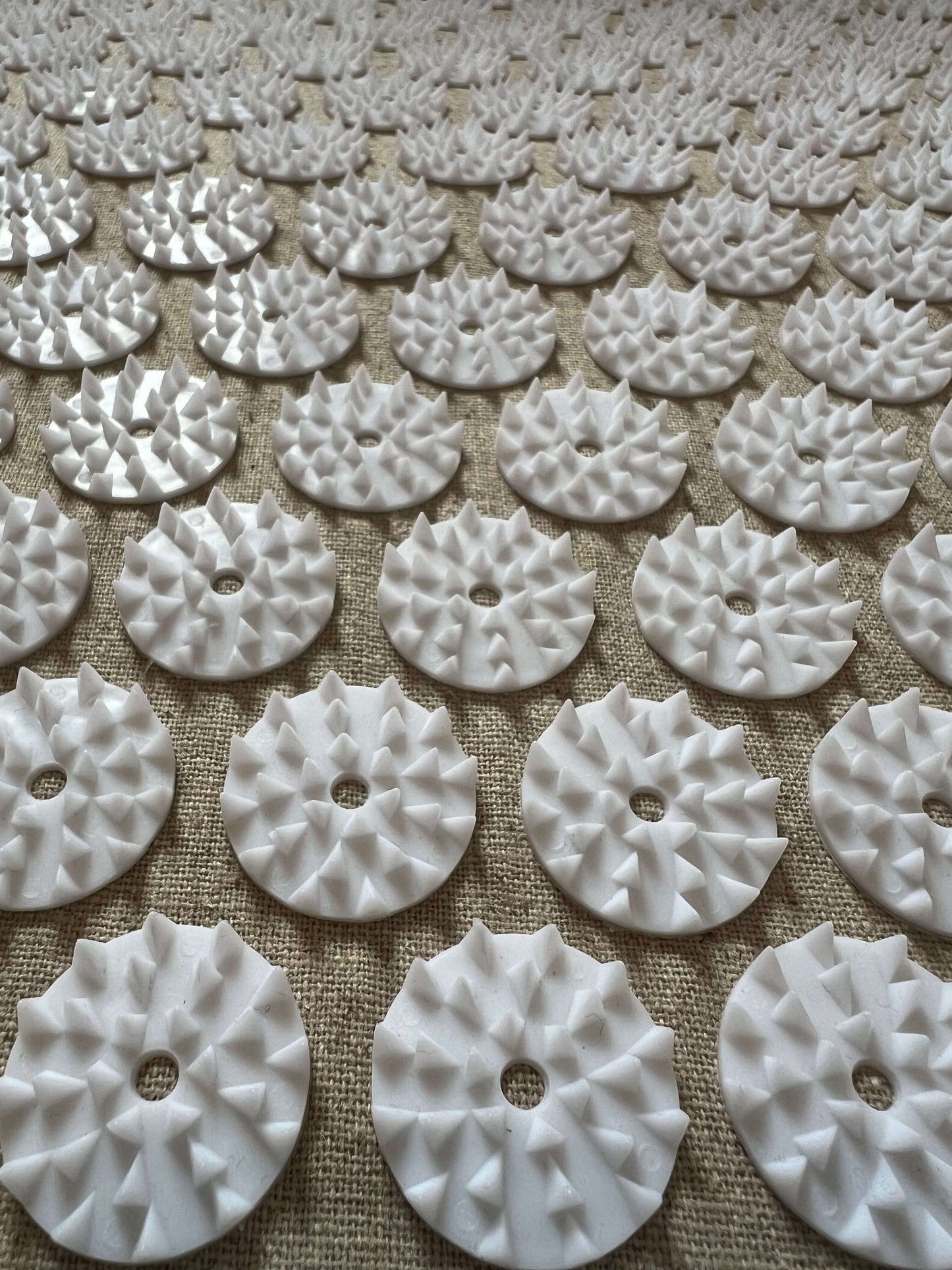 Close-up of beige linen Calmness Eco Acupressure Mat showing detailed texture and spikes - Calmness for deep tissue massage and relaxation